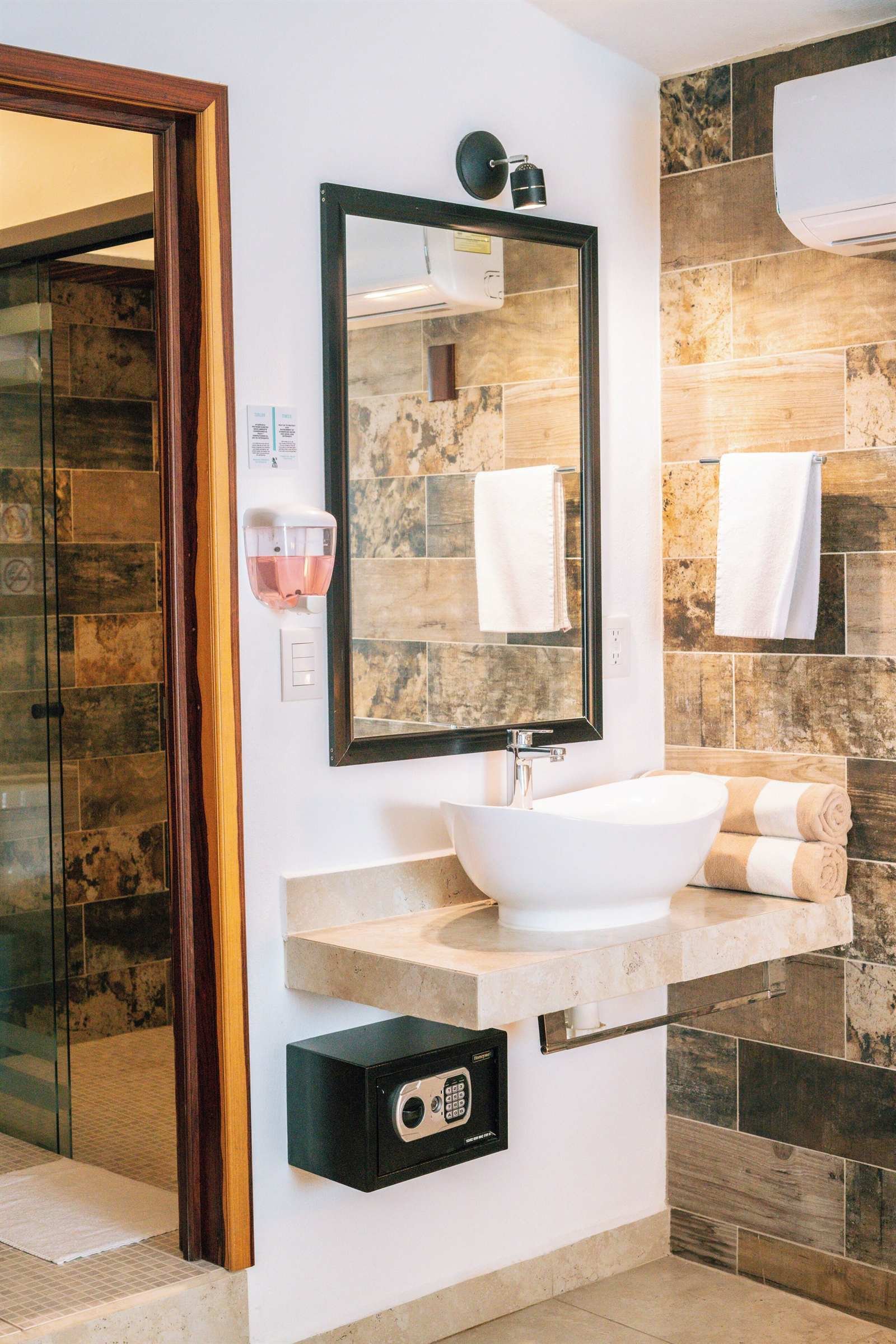 Aldea 19 Bacalar: private bathroom with a white sink and mirror